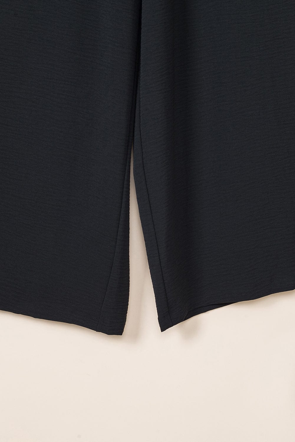 Shoppe EZR Bottoms Black Smocked Sleeveless Wide Leg Jumpsuit with Pockets